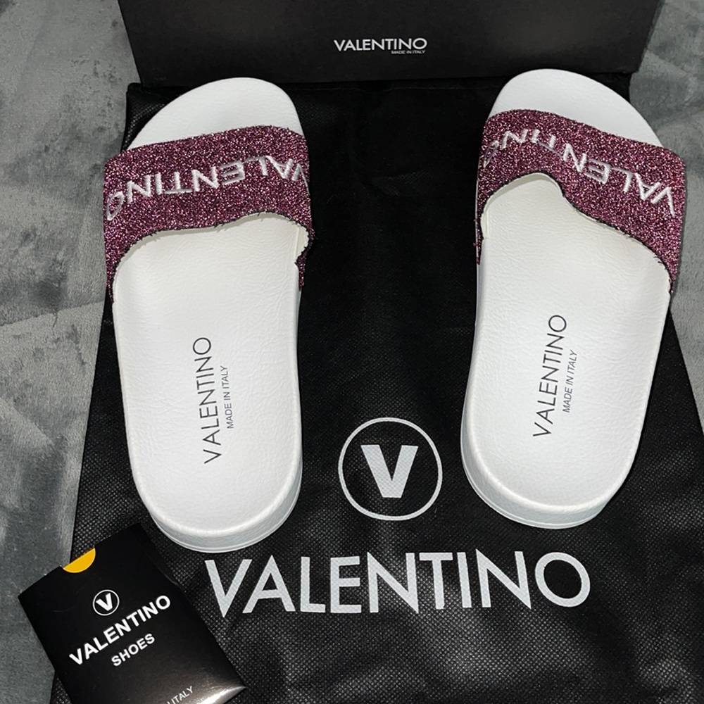 Valentino slides excellent condition NWOT never worn. Size 9 /39 comes with DB